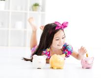 Girl with a piggy bank